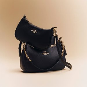 놀리타 19 시그니처 캔버스 백 $119